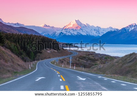 Road to Aoraki Mount Cook at twilight pink sky in NEw Zealand Royalty-Free Stock Photo #1255855795