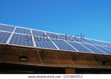Solar cell panels against blue sky background