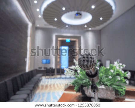 Microphone on podium in workshop room.