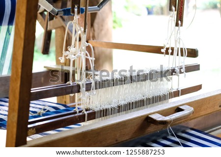 Close up Rope for weaving, hand weaving machine Abstract background - selective focus, Thailand