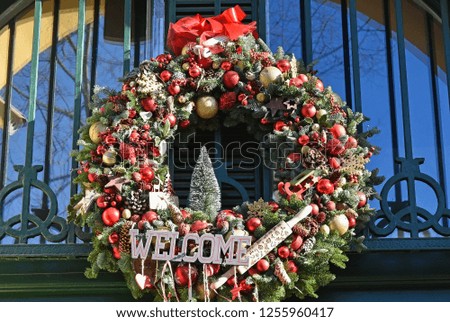 Christmas wreath on the wall of a building