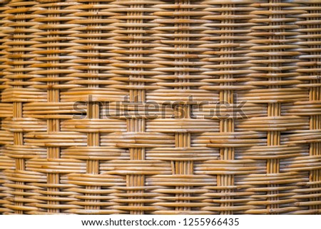 The brown surface is made of rattan, knit together with elaborate.