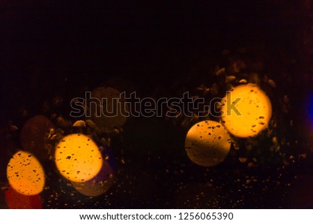 Abstract circular bokeh background of Christmas light. Black Texture, abstraction for copy space