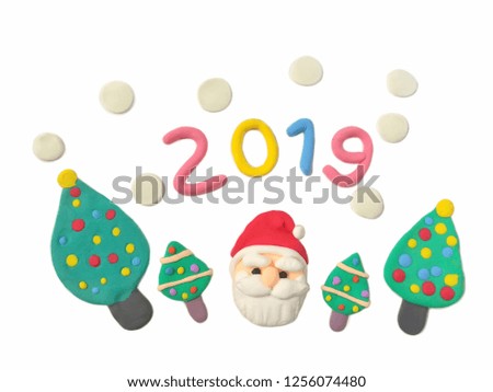 Cute Santa Claus with snow Christmas tree and number 2019 new year handmade from plasticine clay on white background, beautiful festival are dough