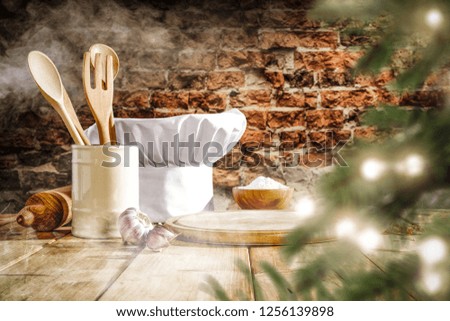 Table background in kitchen and chrismtas tree with smoke decoration 