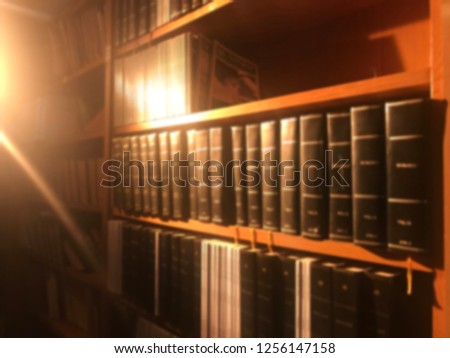 Library and academic books blur background