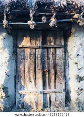 The wooden gate of the kitchen in the traditional house, seongeup folk village, Jeju island