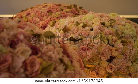 artificial rose flowers with golden horse