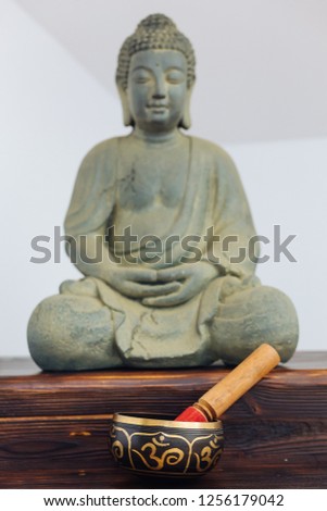 Yoga Studio Decoration Details - Buddha Statue And Incense Sticks Box In A  Pot Decorated With OM (AUM) Symbols, On A Dark Brown Rustic Wooden Tallboy