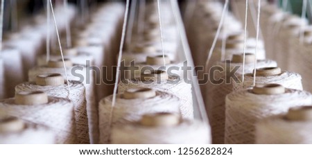 Textile threads industry . Royalty-Free Stock Photo #1256282824