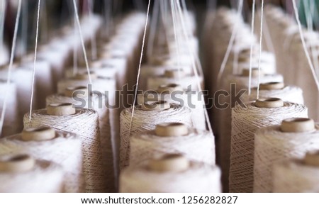 Textile threads industry . Royalty-Free Stock Photo #1256282827