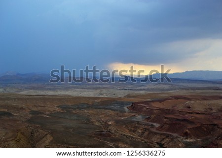 Rain in Mitzpe Ramon, ramon crater in Negev desert, South Israel, floods of water in the desert