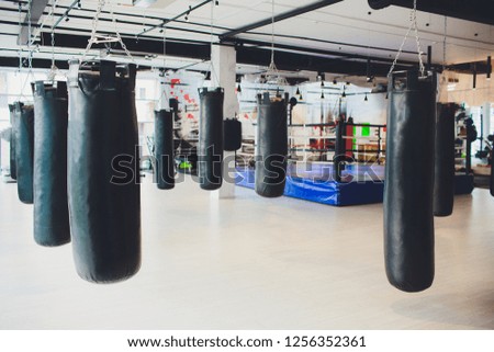 black Punching bag for boxing or kick boxing sport.