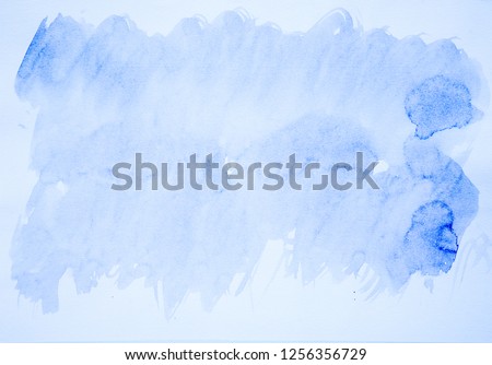 Hand painted watercolour background. Navy blue and soft blue ink watercolor shade texture isolated on white canvas paper. Abstract layer brush backdrop for nature wallpaper. Royalty-Free Stock Photo #1256356729