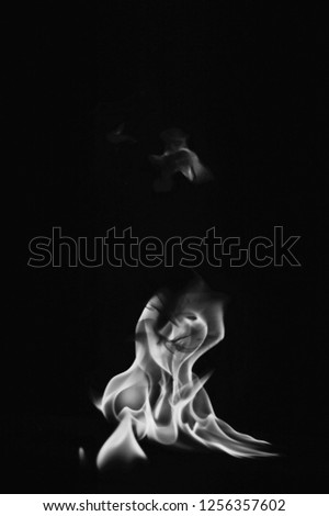 Movement of smoke on black background.