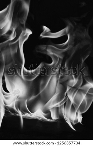 Movement of smoke on black background.