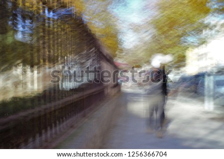 park fence, gardens in Autumn, Tribute to Monet, impressionist photograph of the Park of the Roman circus, Toledo, Spain,  photographic sweeps at low shutter speed, feeling of movement, of life,