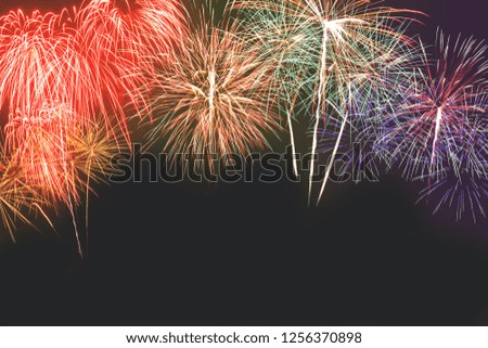 Colorful of fireworks in holiday new year festival on black sky.