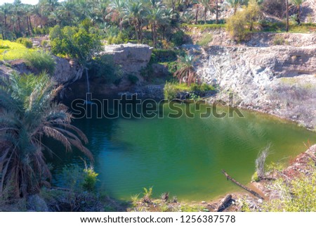 The beautiful waterfall and natural pool of Al Hoqain