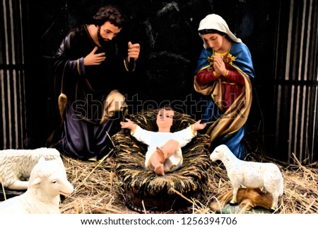 statuettes of Mary, Joseph and baby Jesus,The birthday of Jesus is a statuette of Maria with Joseph and newborn Jesus on the hay