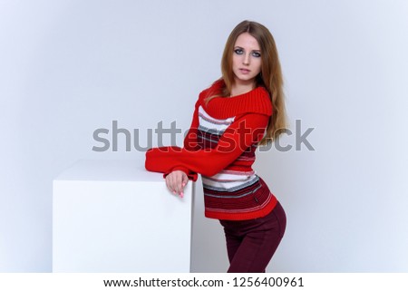 Concept portrait of a beautiful blonde woman girl on a white background in various poses