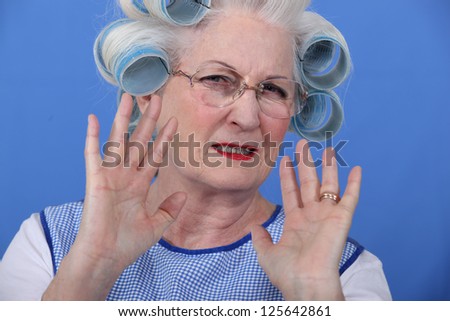 Elder upset with curlers in her hair