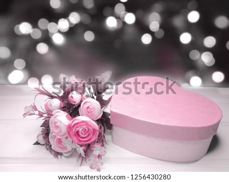 love valentine's day gift box with hearts rose on shiny background 