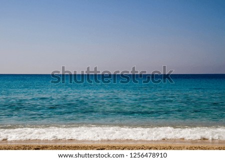 turquoise water wave by the beach