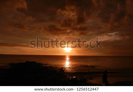 The sun sets in the Indian Ocean in the afternoon. (Padang-Indonesia).