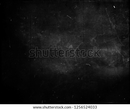 Black scratched grunge background, scary horror distressed texture, old film effect