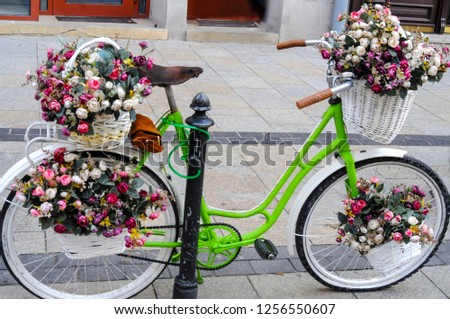 Bright green bike with flowers