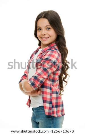 Feel so confident with new hairstyle. Kid girl long curly hair posing confidently. Girl curly hairstyle smiling face feels confident. Child hold hands confidently crossed chest. Upbringing confidence.