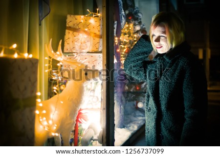 woman at the Christmas window