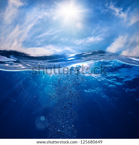 design template with underwater part and sunset skylight splitted by waterline Royalty-Free Stock Photo #125680649