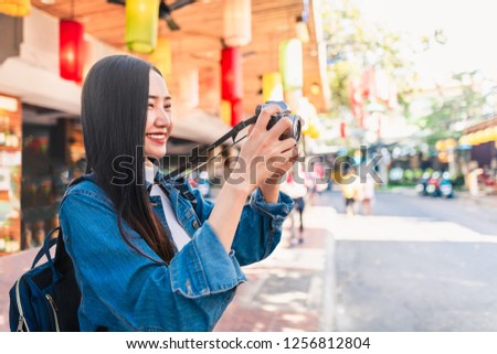 Happy young Asian woman traveler joy relaxing at Khaosan Road taking photo, Famous landmark travel Bangkok Thailand, Tourist on summer holidays vacation trips, Tourism beautiful destination place Asia