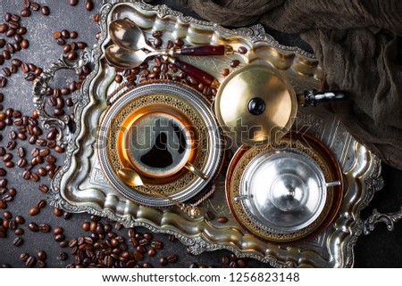 Black coffee on old background