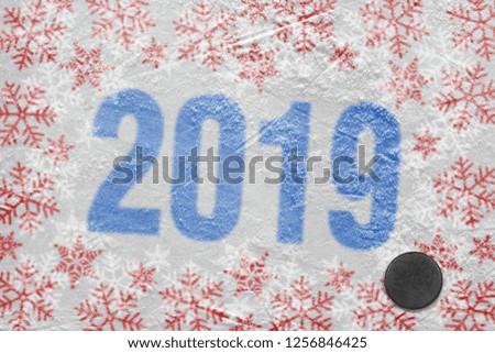 Season 2019, hockey rink and puck. Concept, background, winter