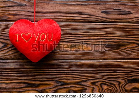A symbol of love on brown background derevier 
