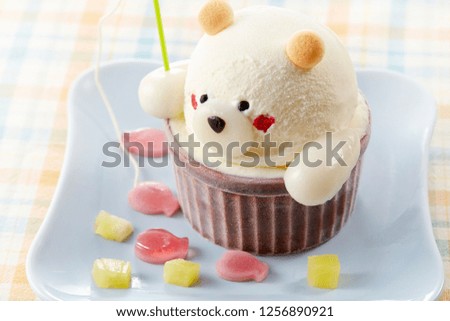 Vanilla ice cream in the shape of bear which goes fishing