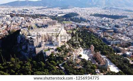 Aerial drone bird's eye view photo of iconic Acropolis hill and Masterpiece construction of ancient wolrd famous Parthenon, Athens, Attica, Greece