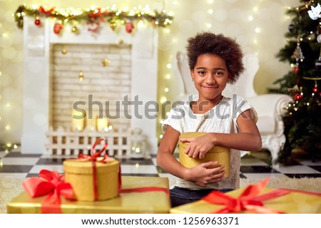 feamle teenager is preparing to celebrate merry christmas and happy new year