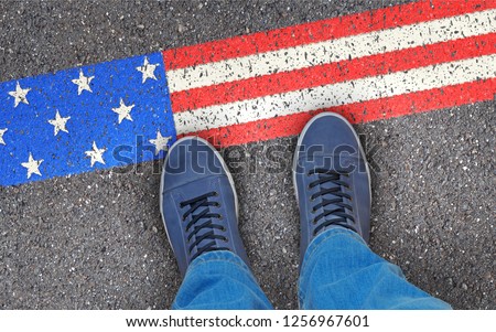 Symbolic image: Immigration in the USA Royalty-Free Stock Photo #1256967601