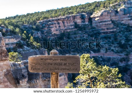Sign pointer on the observation deck of the Grand Canyon. One of the deepest canyons in the world. Located on the Colorado plateau, in the Grand Canyon national Park. USA, Arizona, November 2018