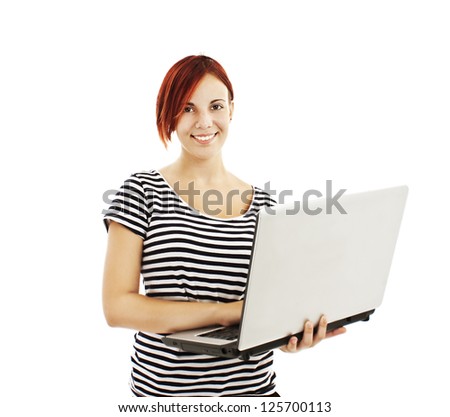 Portrait of a pretty young woman standing with a laptop.  Isolated on white background