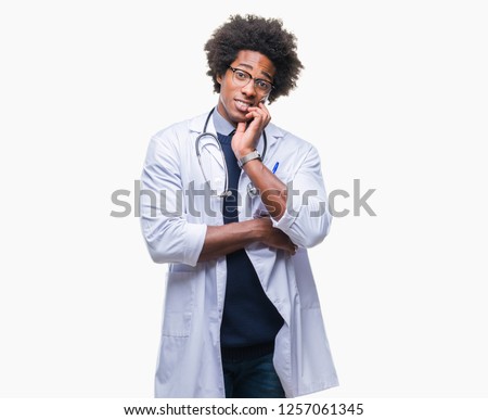 Afro american doctor man over isolated background thinking looking tired and bored with depression problems with crossed arms.