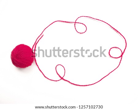 Background of wool yarn, knitted yarn, can also be used as a yarn frame. Red knitting yarn for handicrafts isolated on white background.