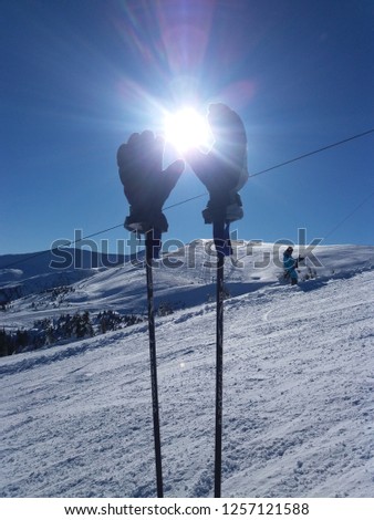 Ski equipment on the background of snowy mountains