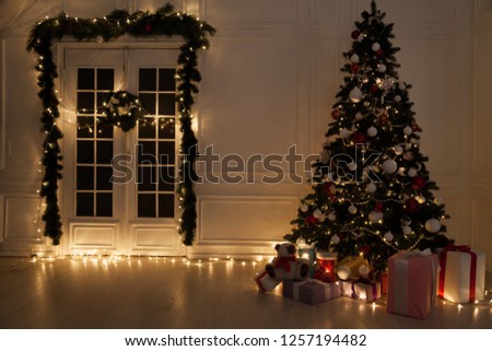 Christmas tree with presents, Garland lights new year winter holiday