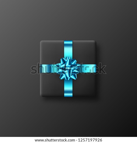 Realistic black gift box with glittering blue bow and ribbon. Decorative design element for holidays. Vector illustration.