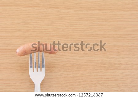 Sausage and fork